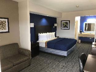 Executive Inn And Suites Joaquin Rum bild