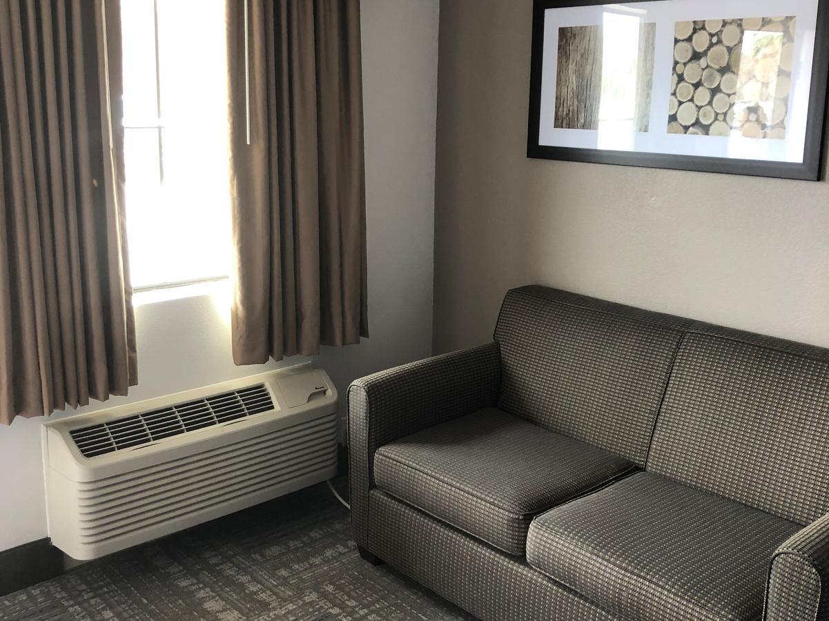 Executive Inn And Suites Joaquin Exteriör bild